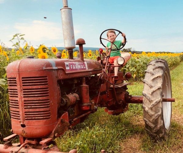 child on tractor
